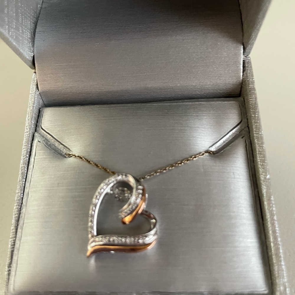 Zales Unstoppable Love (TM) Diamond accent tilted heart pendant